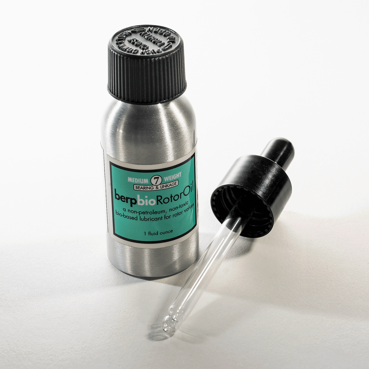 Bottle of berp bio Rotor Oil with a dropper on a white background