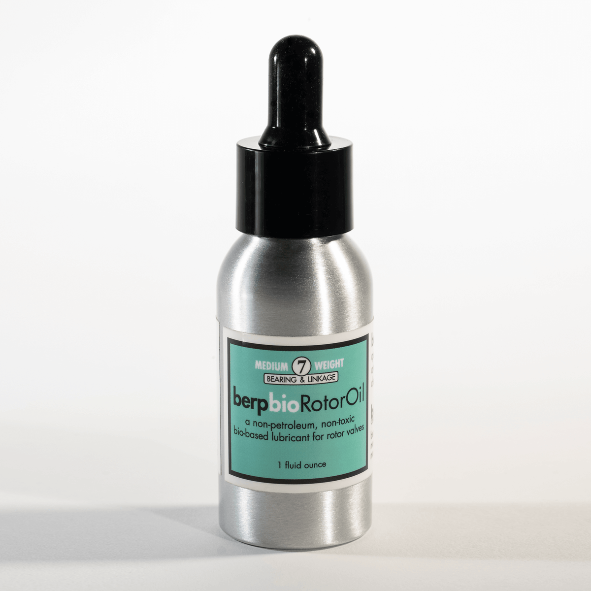 Bottle of berp bio Rotor Oil with a dropper on a white background